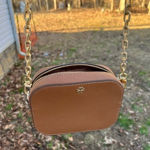 Small Tory Burch purse with chain detail on strap